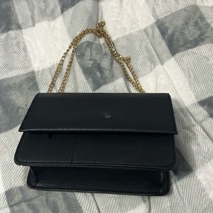 Francesca’s purse has small stain